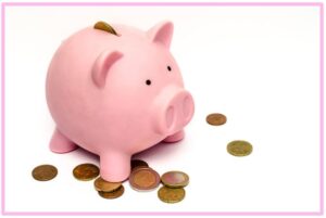 pink piggy bank to symbolize saving for a home